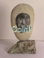 Inuit sculpture - face in stone